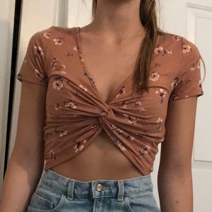 Cute printed crop top with tied front.